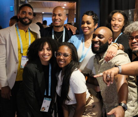 A group of people posing for the camera.
